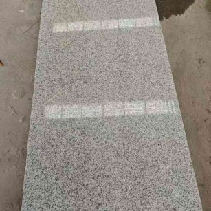 珠海芝麻白光面毛板