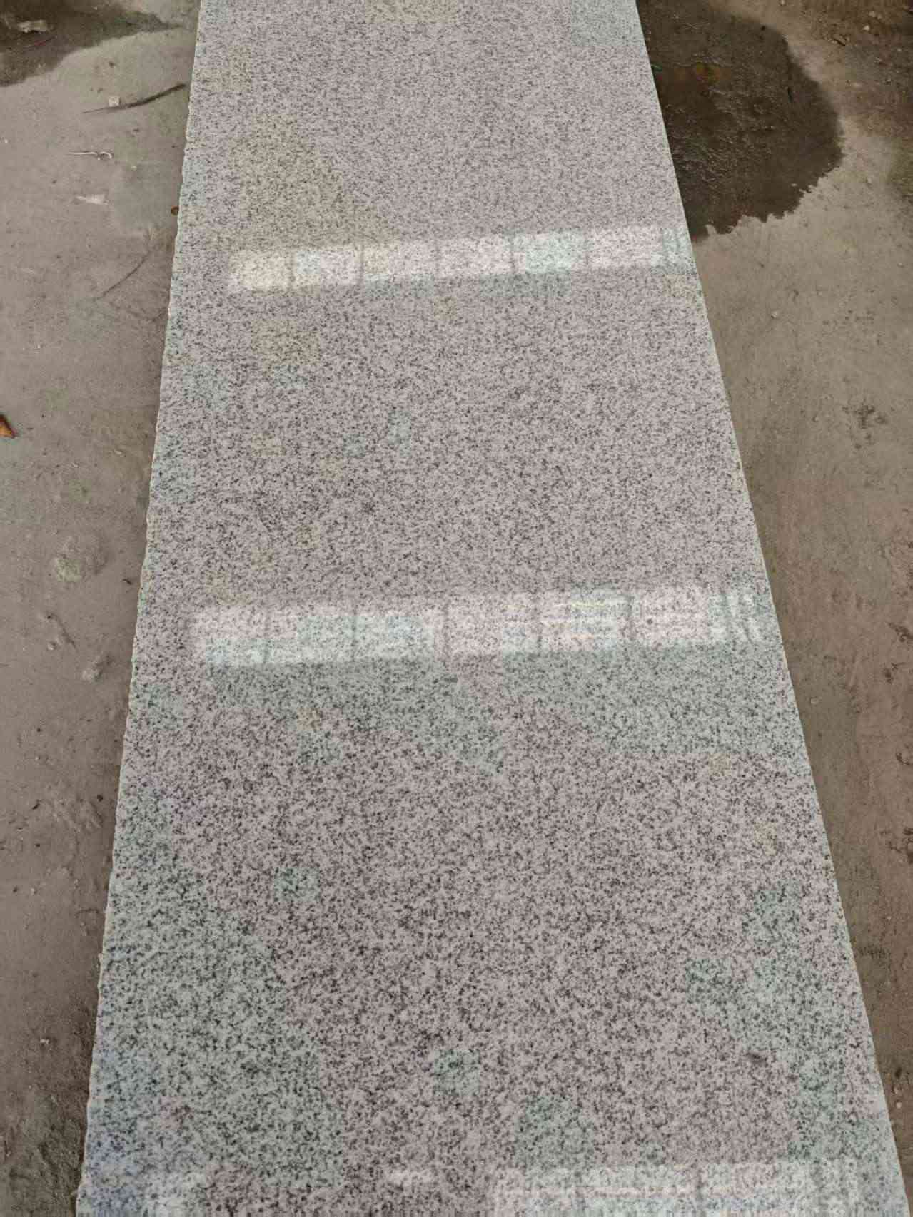 珠海芝麻白光面毛板